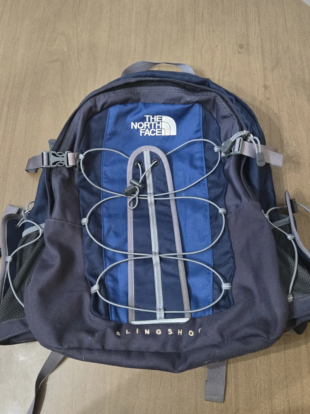 The North Face Slingshot Backpack in Navy and Charcoal